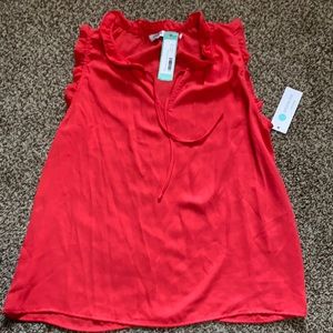 Red sleeveless top